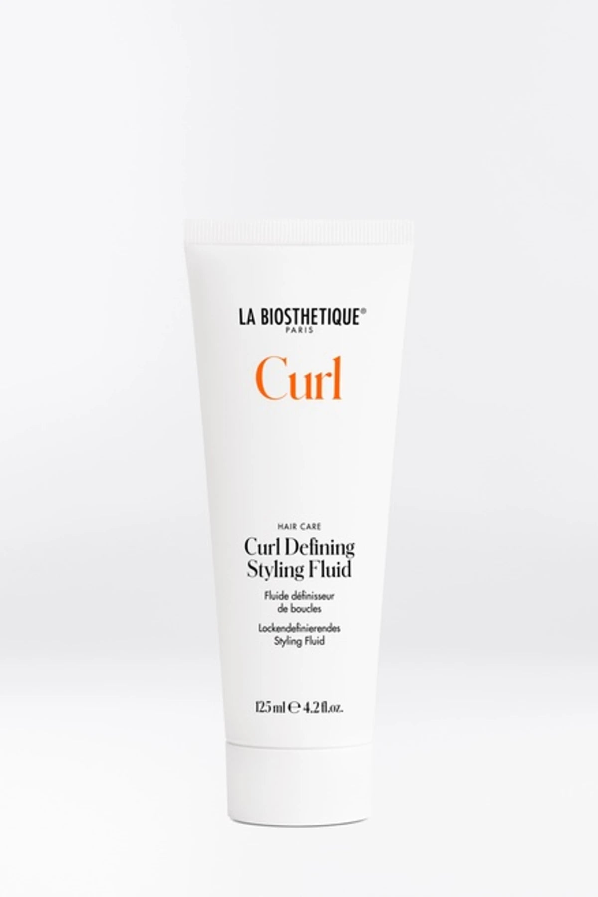LOCKENDEFINIERENDES STYLING-FLUID
